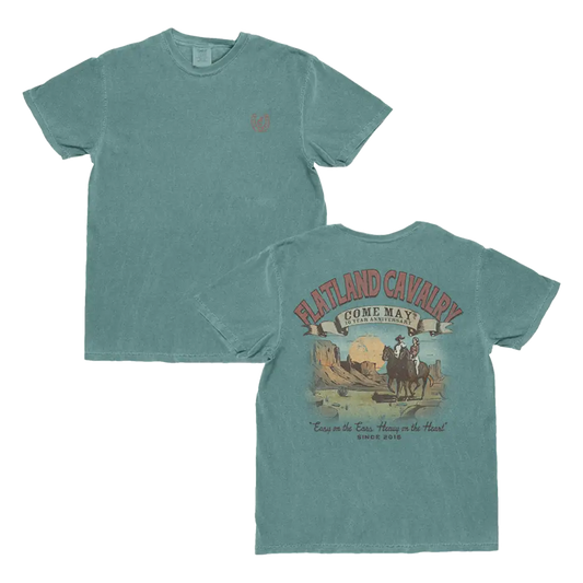 Teal t-shirt with cowboy graphic.