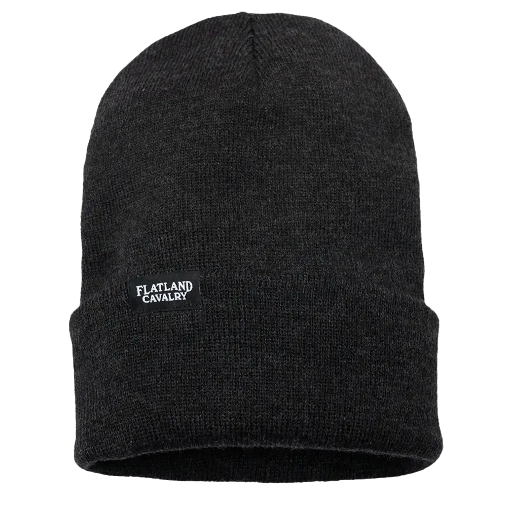 Black knit beanie with a small ’Flatland Cavalry’ logo patch.