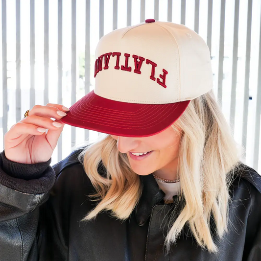 Two-tone baseball cap.