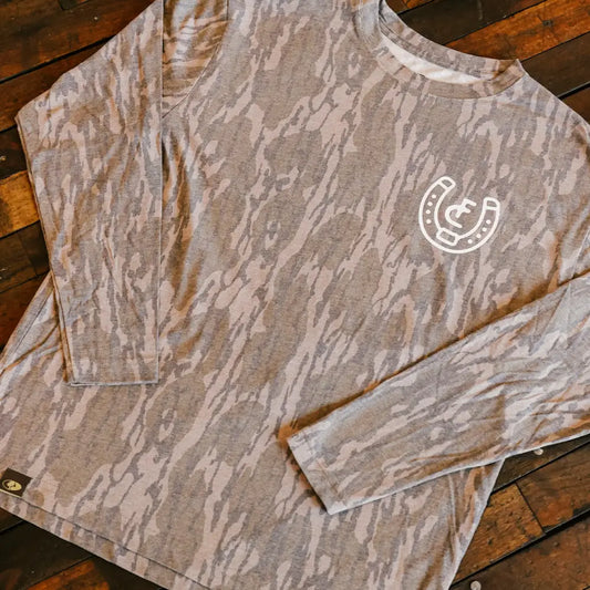 Gray long-sleeve shirt with a wood-grain camouflage pattern and a white horseshoe logo on the chest.