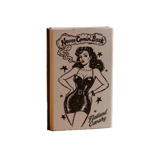 A beige matchbook featuring a black ink illustration of a pin-up woman smoking, with the text ’never comin’ back’ and ’flatland cavalry.’