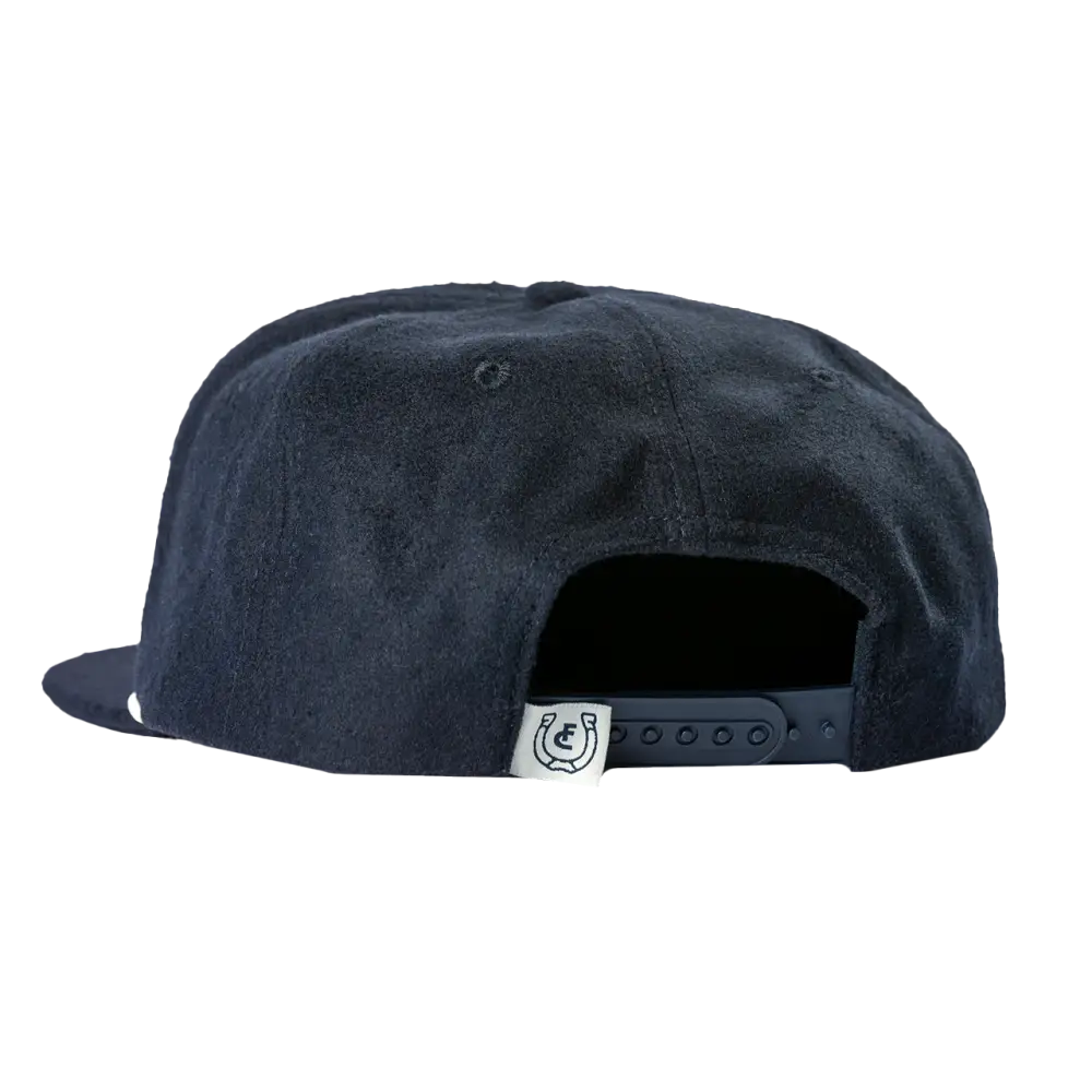 Navy blue snapback cap with an adjustable strap at the back.