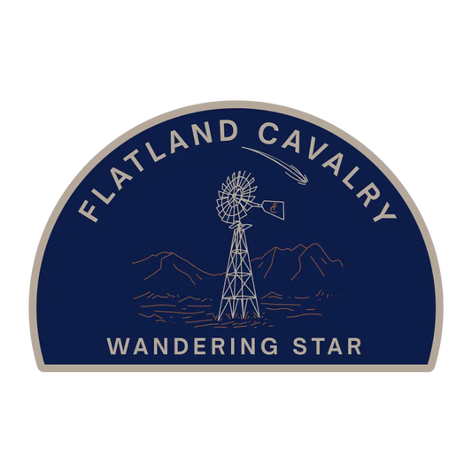 Semicircular logo sticker featuring a windmill and mountains with text ’Flatland Cavalry Wandering Star’.