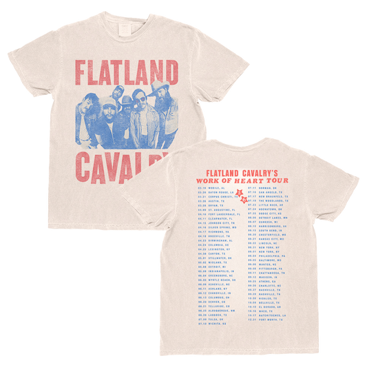 Cream-colored cotton flatland cavalry work of heart tour tee showing blue and red band graphic with heart tour itinerary on back